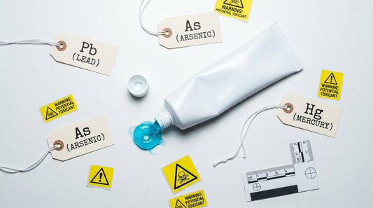 Toothpaste tube with heavy metal contamination tags showing lead arsenic and mercury warnings